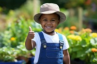 Black man gardener thumbs up portrait outdoors smile. AI generated Image by rawpixel.