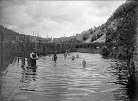 Bathing in a pool on the river flat (25 December 1910) by Leslie Adkin.