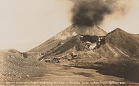 Ngaurahoe in eruption showing Red Crater and Ruapehu. (circa 1900).