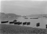Boats anchored in a harbour (1880-1925) by Crombie and Permin.