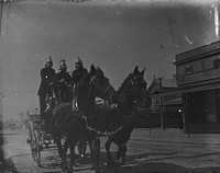 Fire brigade in action by Fred Brockett.