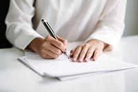 Student taking notes writing white pen. AI generated Image by rawpixel.