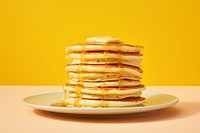 Pancake plate yellow food. AI generated Image by rawpixel.