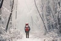 Man in snow storm adventure outdoors backpack. AI generated Image by rawpixel.