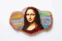 Mona lisa brooch bead white background. AI generated Image by rawpixel.