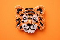 Cute tiger jewelry bead art. AI generated Image by rawpixel.