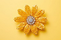 Sunflower jewelry yellow brooch. AI generated Image by rawpixel.