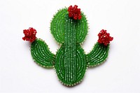 Cactus brooch plant bead. AI generated Image by rawpixel.