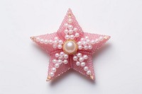 Star jewelry brooch shape. AI generated Image by rawpixel.