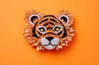 Cute tiger jewelry brooch art. AI generated Image by rawpixel.