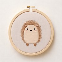 Embroidery hedgehog textile craft. AI generated Image by rawpixel.