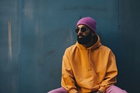Streetwear portrait sitting adult. AI generated Image by rawpixel.