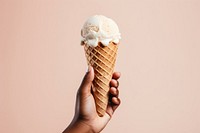 A hand holding a melting earth ice-cream dessert waffle food. AI generated Image by rawpixel.