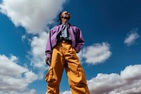 Man wearing cargo pants photography standing fashion. AI generated Image by rawpixel.