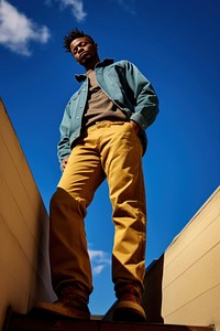 Man wearing jeans photography standing footwear. AI generated Image by rawpixel.