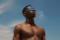 Black man sunglasses summer blue. AI generated Image by rawpixel.