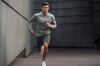 Man running in sports outfit jogging shorts adult. AI generated Image by rawpixel.