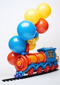 A balloon twisting in the shape of a train celebration anniversary locomotive. AI generated Image by rawpixel.