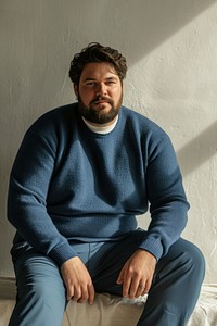 Blue trousers and sweater photography portrait sitting. AI generated Image by rawpixel.