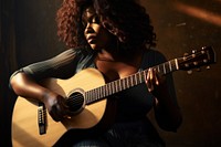 Playing guitar musician black entertainment. AI generated Image by rawpixel.