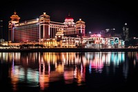 Casino skyline waterfront architecture illuminated. AI generated Image by rawpixel.
