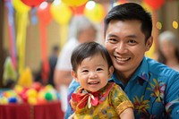 1st birthday party of Malaysian portrait family father. AI generated Image by rawpixel.