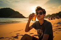 Thai teenager drinking at Bangsean Beach beach outdoors nature. AI generated Image by rawpixel.