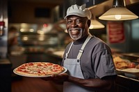 A multiracial man in apron at pizza shop adult food chef. AI generated Image by rawpixel.