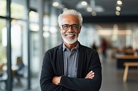 A multiracial senior man architect glasses adult smile. AI generated Image by rawpixel.
