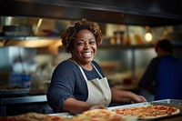 A middle age multiracial woman in apron making a pizza at pizza shop adult food entrepreneur. AI generated Image by rawpixel.