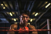 Thai boxer on the boxing ring sports adult determination. 