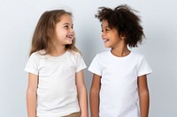 2 children wearing white t-shirt laughing fashion sleeve. AI generated Image by rawpixel.