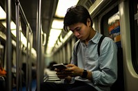 Indonesian student in the train sitting architecture convenience. AI generated Image by rawpixel.