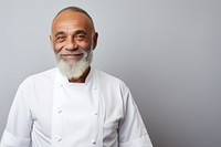 Multiracial old male chef cheerful adult smile. AI generated Image by rawpixel.