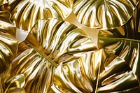 Monstera pattern texture gold backgrounds metal. AI generated Image by rawpixel.