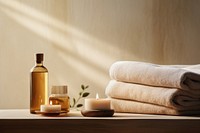 Beautiful spa composition on massage table in wellness center lighting bottle refreshment. AI generated Image by rawpixel.