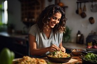 Female cooking south asian food kitchen adult. 