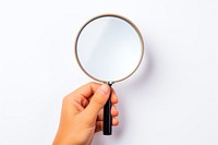 Hand hold magnifying glass photo white background photography. AI generated Image by rawpixel.