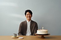 Happy man Taiwanese birthday party cake dessert smile. AI generated Image by rawpixel.