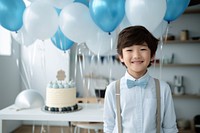 Happy boy Japanese birthday party cake balloon child. AI generated Image by rawpixel.