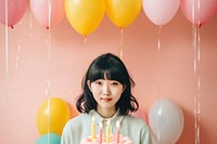 Happy girl Taiwanese birthday party balloon candle cake. AI generated Image by rawpixel.