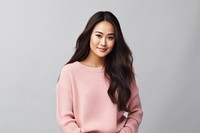 Happy young asian woman sweater portrait adult. AI generated Image by rawpixel.