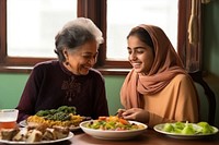 Senior women and a girl teenager south asian food adult plate. AI generated Image by rawpixel.