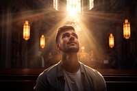 Man praying in church light spirituality photography. AI generated Image by rawpixel.