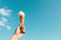 Hand holding ice cream dessert food blue. AI generated Image by rawpixel.