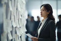 Korean business woman looking adult contemplation. AI generated Image by rawpixel.