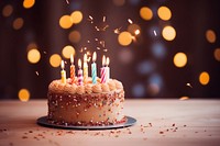 Birthday cake on a table dessert party food. AI generated Image by rawpixel.