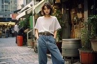 Nippon girl full body not potrait jeans outdoors denim. AI generated Image by rawpixel.