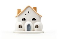 Fat house form figurine white background confectionery. AI generated Image by rawpixel.