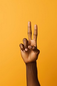 Hand doing peace sign pose finger adult gesturing. AI generated Image by rawpixel.